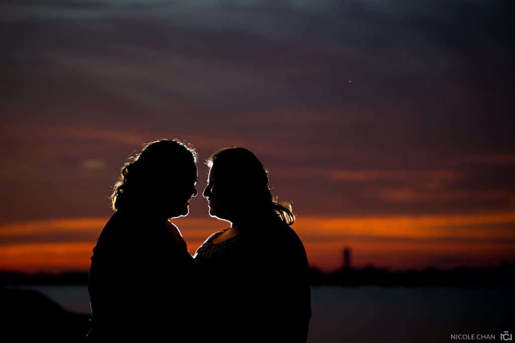 Same sex lesbian engagement photos at Wollaston Beach in Quincy, mA