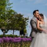Danversport Yacht Club Asian outdoor wedding. Wedding couple photos at Christopher Columbus Park near Boston waterfront harbor