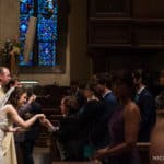 Emotional bride and groom at St. Ignatius Parish wedding, on Boston College’s Campus