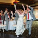 a bride and groom are dancing on the dance floor.