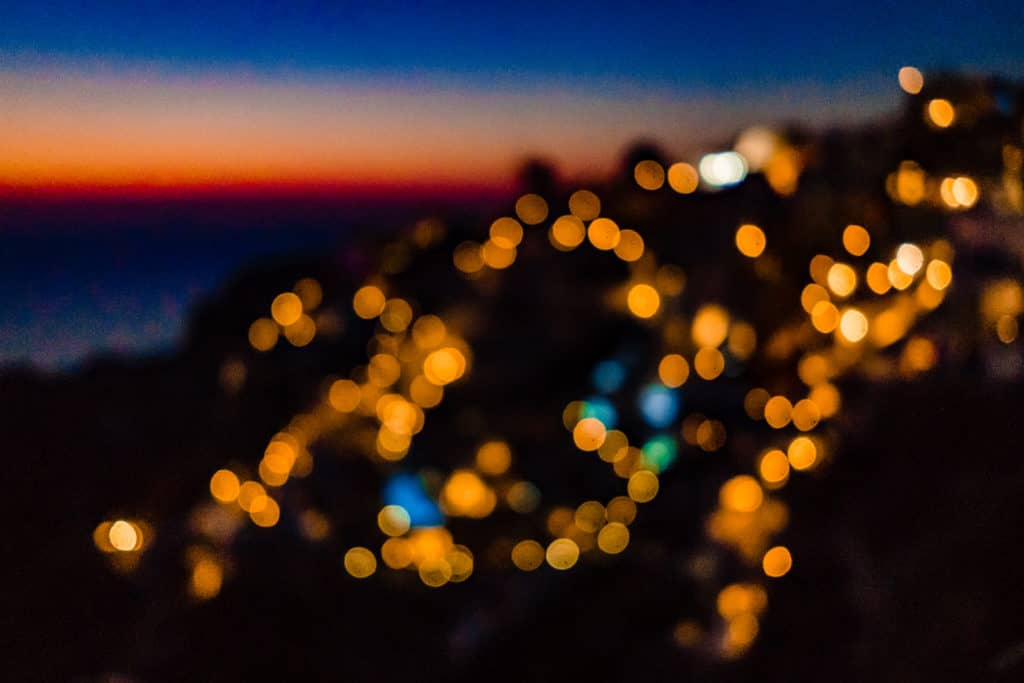 a blurry photo of lights on a hill.