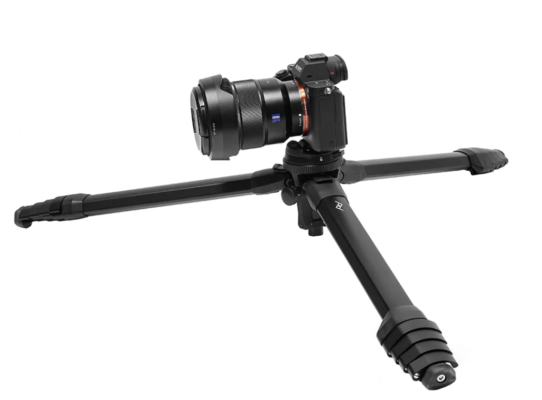 a tripod with a camera attached to it.