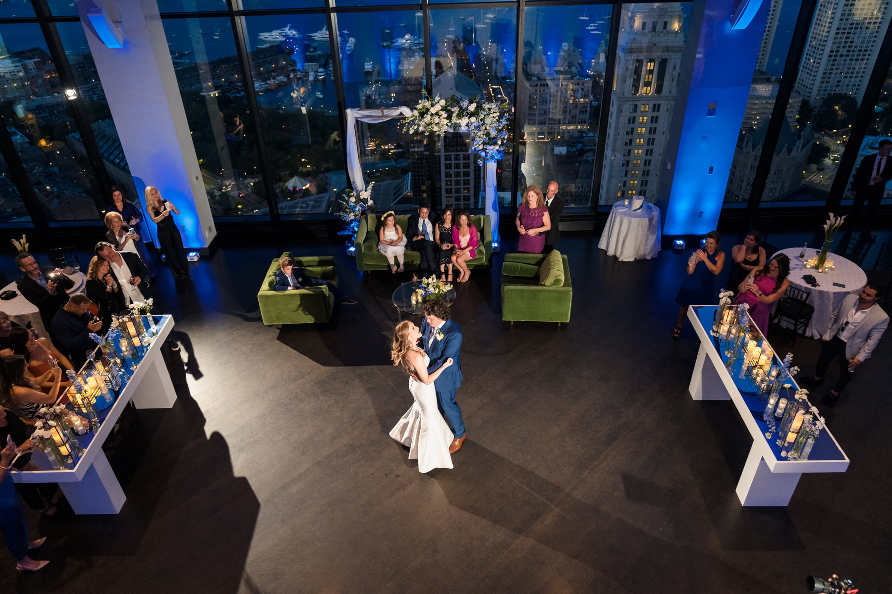 a bride and groom share their first dance at their wedding reception.